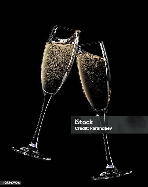 Cheers Two Champagne Glasses Stock Photo - Download Image Now - Champagne, Champagne Flute, Celebratory Toast