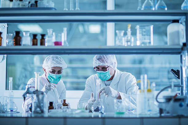 istock Scientists analyzing chemical substances for a new research. 495343120