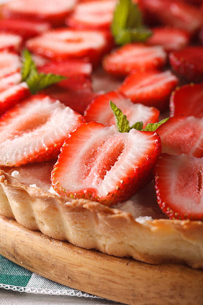 istock strawberry tart with cream cheese macro. vertical background 495343130
