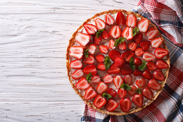 istock beautiful tart with fresh strawberries. horizontal top view 495344660