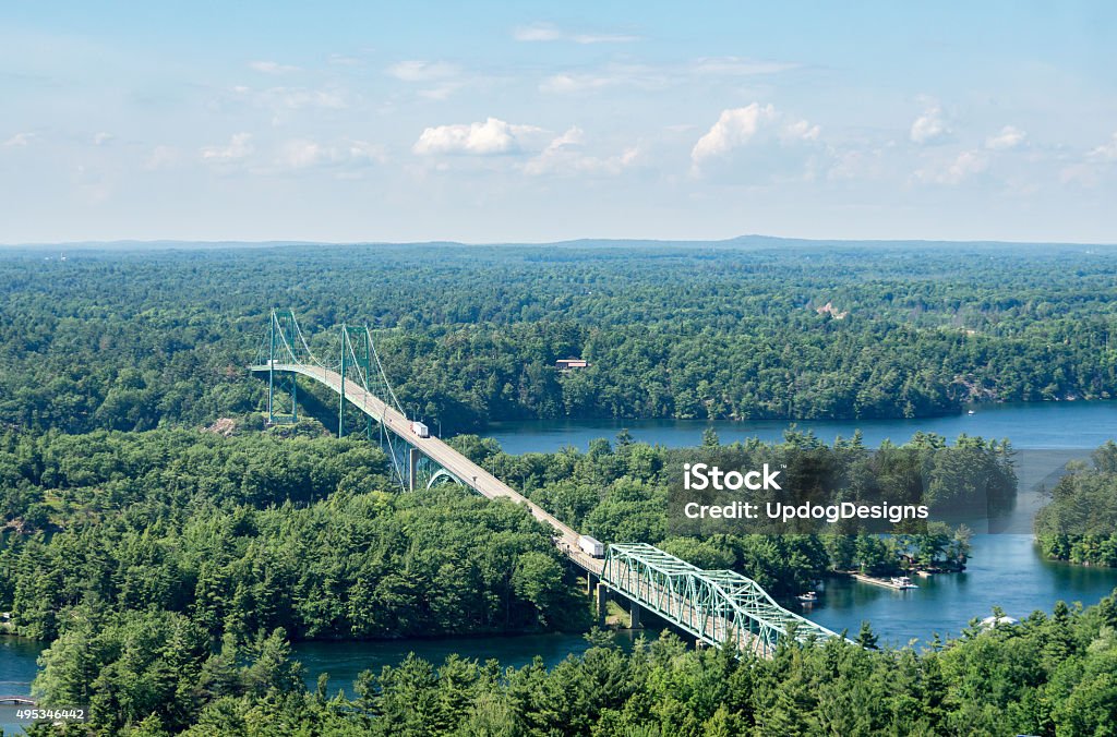 Thousand Islands Bridge with Trucks trucks cross the Thosand Islands Bridge which connects Ontario, Canada and New York State, USA Kingston - Ontario Stock Photo