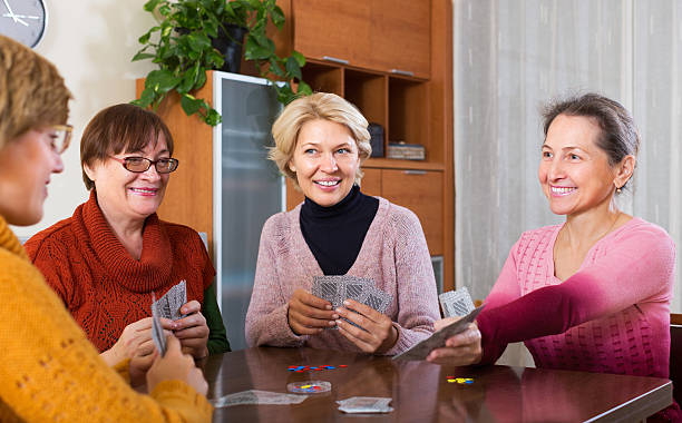 istock Female having fun with cards 495346892