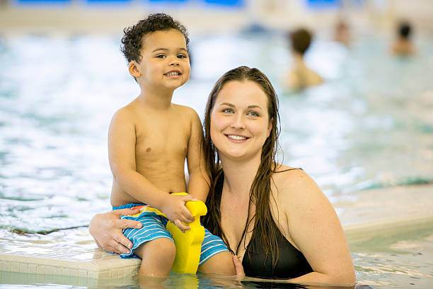 istock Mother and Son at the Swimming Pool 495346900