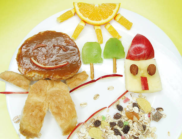 istock creative breakfast with fruit and sweet chocolate creme on bread 495348518
