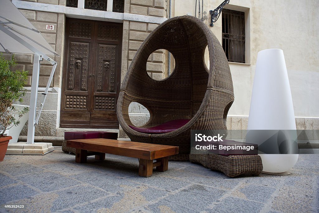 Wicker chairs Photo of Wicker chairs in Trapani, Sicily Bar - Drink Establishment Stock Photo