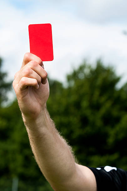 istock Red card shown in sports game 495353643