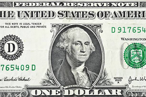 istock macro close up shot with one dollar bill 1$ 495353789