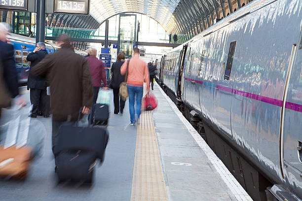 istock Blur Movement people in Rush Hour train station, London, UK 495353825