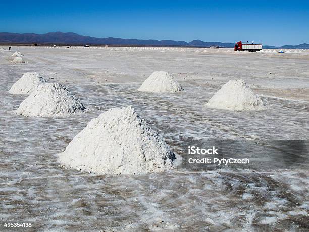 Salt Piles On Bolivian Salar De Uyuni Stock Photo - Download Image Now - Lithium, Mine, Mining - Natural Resources