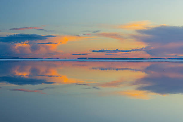 istock Melting spring mountain lake in the setting sun. 495355291