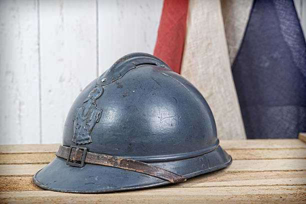 istock french helmet and old french flag 495355563