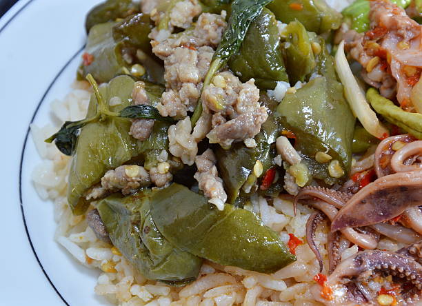 istock spicy stir-fried eggplant with chop pork and basil leaf 495356656