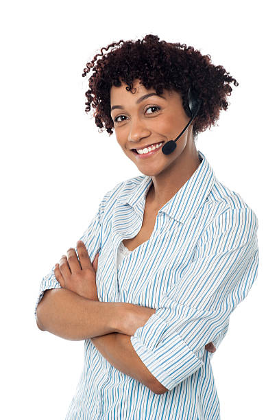 istock Smiling woman in hands free headset device 495356715