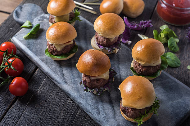 istock Beef burgers on serving board 495358818