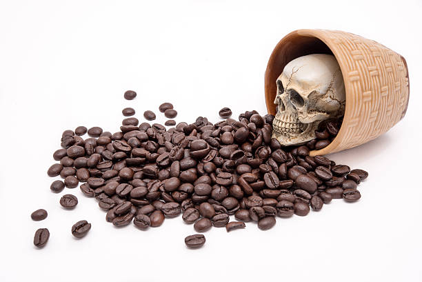 istock Skull in a glass and coffee beans 495361716