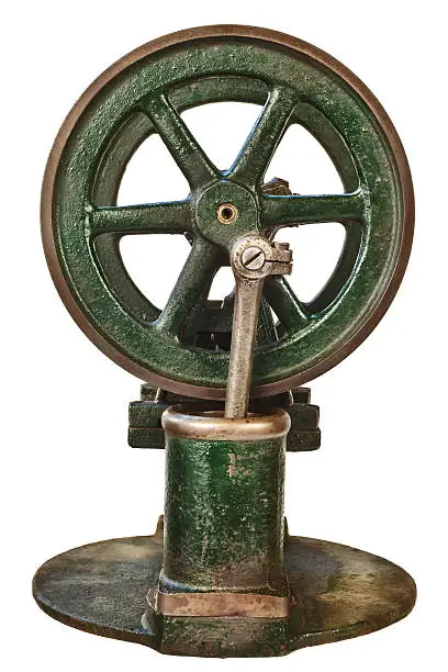 Wheel of an old steam engine isolated on a white background