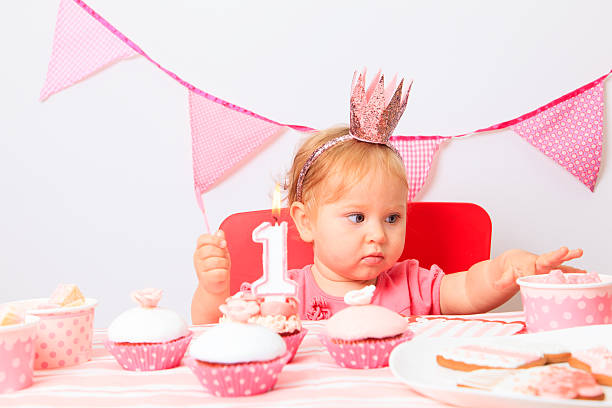 istock cute little princess at first birthday 495377652