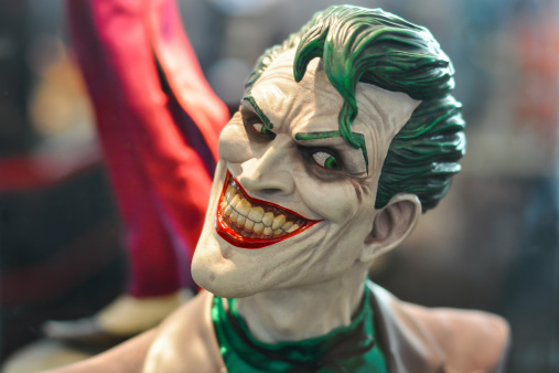 Bangkok,THAILAND - May 09, 2014 : The Joker figure model head shot. The Joker is a super villain and the archenemy of Batman.