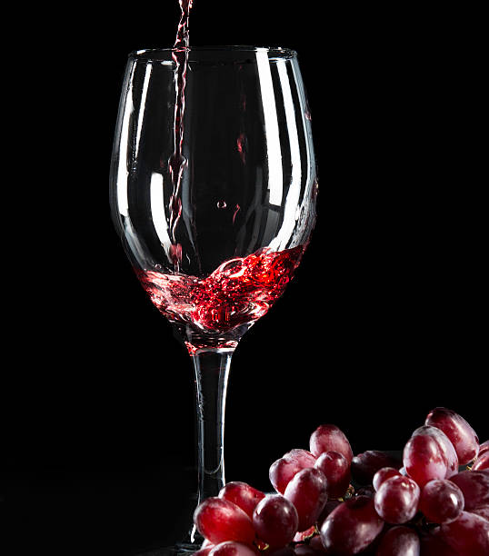 istock Close up of Red Wine and grapes. 495384191