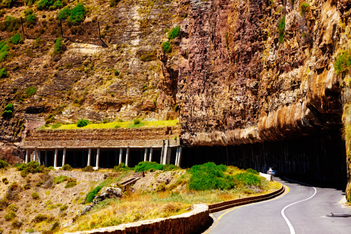 After recent rock falls, The cliffside above Chapmans Peak Drive in Cape Town - a popular scenic route and part of the Table Mountain National Park - has been stabilized with rock galleries, catch fences, gabions and rock barring as a comprehensive protecvtive measure.