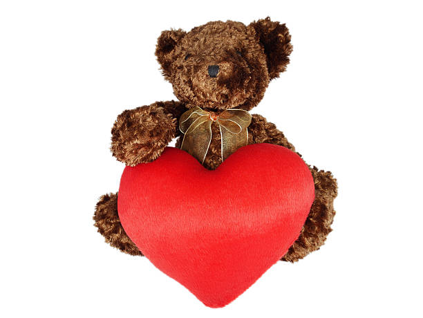 istock Brown teddy bear holding big red heart 495387512
