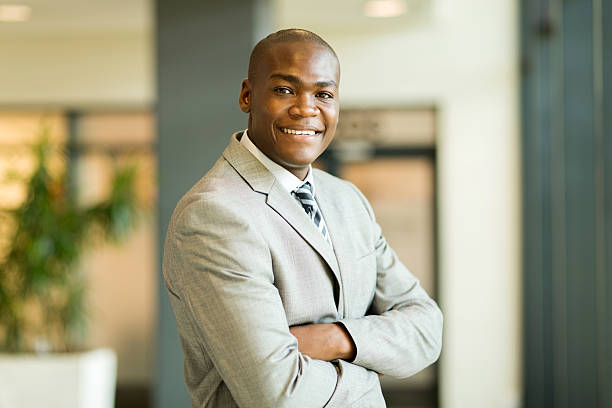 istock young african office worker with arms crossed 495387980