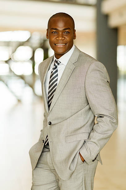 istock young afro american businessman standing 495390044