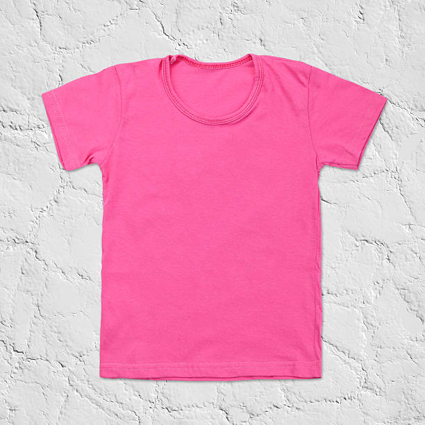 istock Pink blank t-shirt on dark stone background 495390702