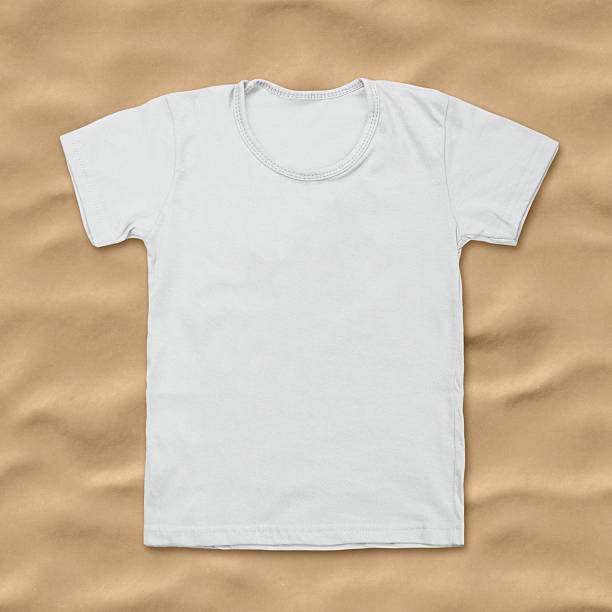 istock White blank t-shirt on dark sand desk 495390804