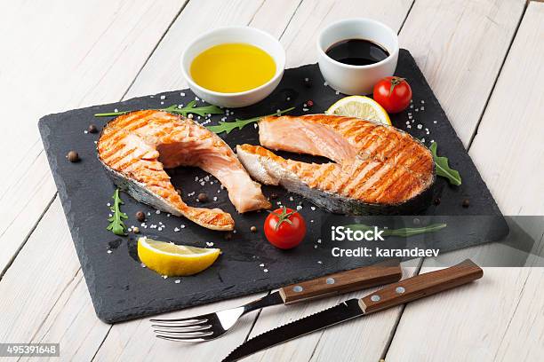 Grilled Salmon Salad And Condiments Stock Photo - Download Image Now - Grilled Salmon, 2015, Barbecue - Meal
