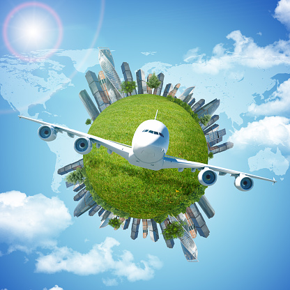 Jet with earth and modern city on blue sky background