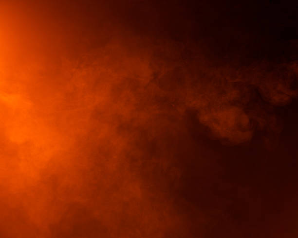 istock Bright Orange Fog on Dark Background 495414410