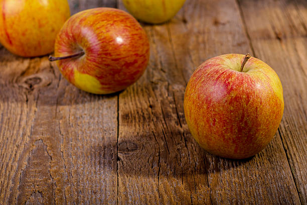 istock apples on a wooden table 495415161