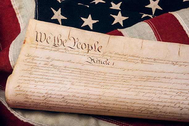 United States Constitution on an American flag stock photo