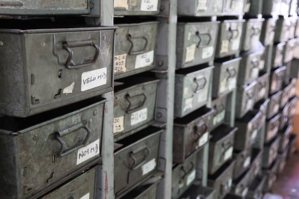istock Rows of metal boxes on shelves 495415245