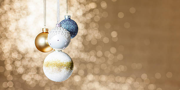istock gold christmas baubles 495415476