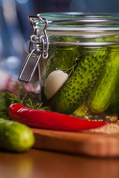 istock Close up of jar with pickled cucumbers 495416387