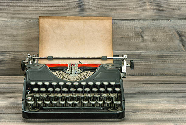 istock Antique typewriter with grungy paper. Retro style 495416514