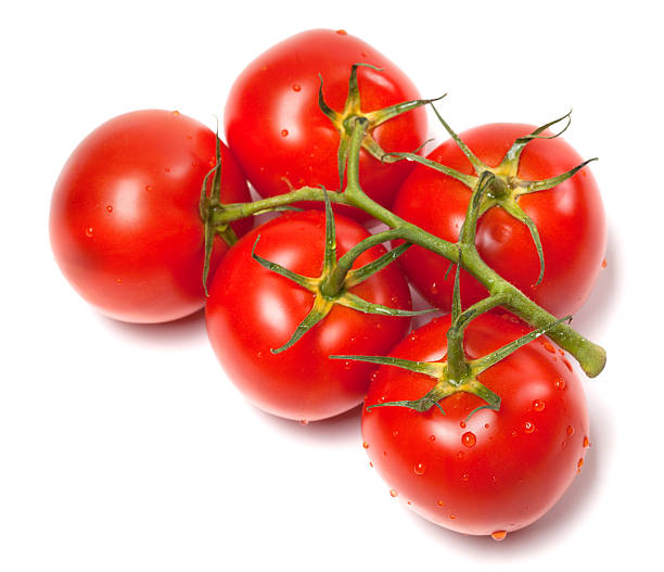istock Bunch of fresh tomatoes with water drops. Top view. 495416639