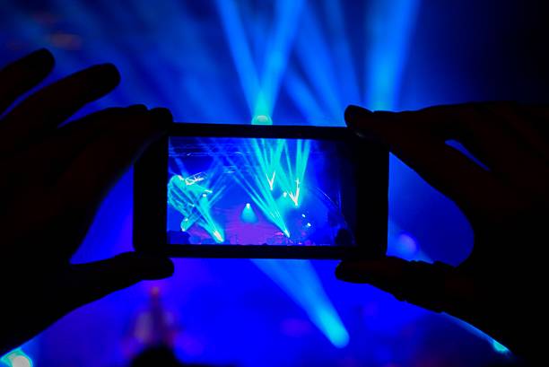istock Taking picture at a music concert 495416774