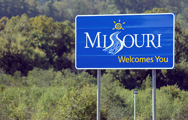 Welcome to Missouri Pineville, MO, USA – October 4, 2012: A welcome sign at the Missouri state line located in Pineville. Missouri is a U.S. state located in the Midwest and is the 24th state admitted to the union.  springfield missouri photos stock pictures, royalty-free photos & images