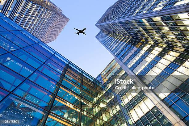 Jet Airplane Take Off Office Building London City England Uk Stock Photo - Download Image Now