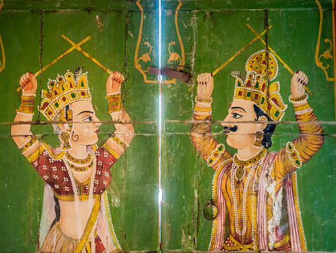 Bikaner, India - September 30, 2015: Jain temple Bhandreshwar paintings in Bikaner Rajasthan India. It was once the capital of the princely state of Bikaner. It was founded by Rao Bika in 1486. It is now the fourth biggest city in Rajasthan and although not receiving as many tourists as other cities in the state it is slowly gaining popularity because of the beautiful havelis (houses) an amazing fort palaces and temples like the one in the image. Bhandreshwar was started in 1468 and completed in 1514. The temple is dedicated to the fifth Jain Tirthankara (founders of the Jain religion), Sumatinathji.