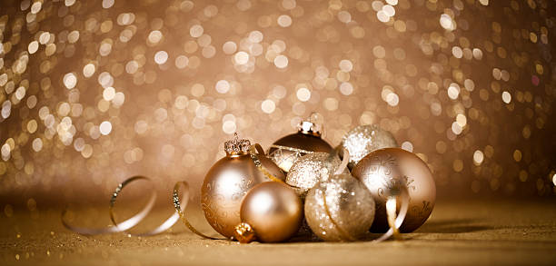 istock Christmas Baubles against Gold Defocused Lights Background 495418206