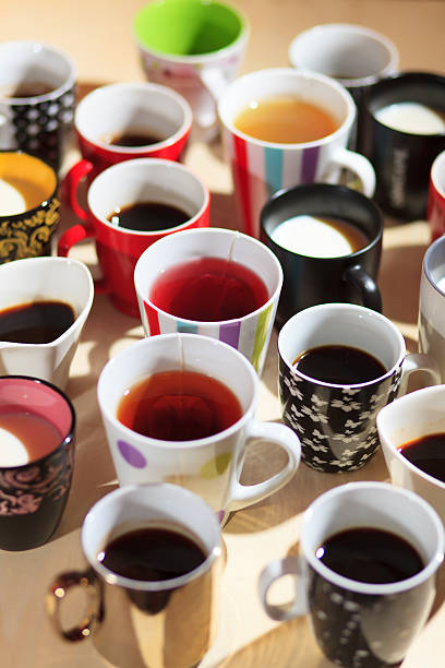 istock tea, coffee and milk in cups from above 495418680