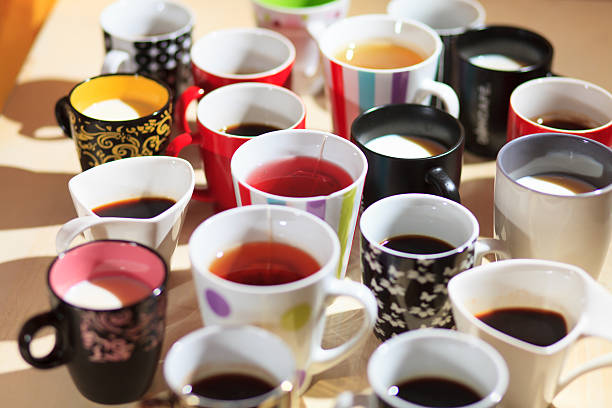 istock tea, coffee and milk in cups from above 495418792