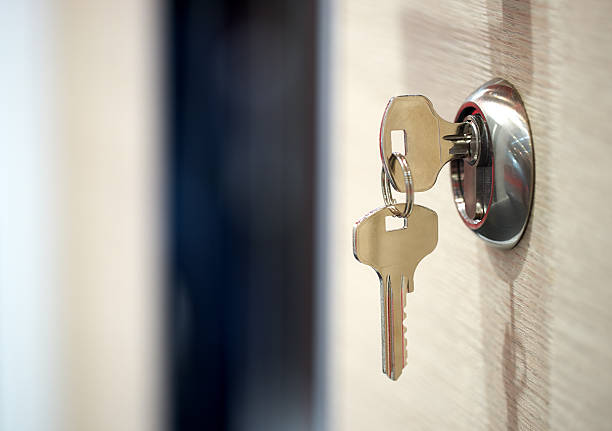 keys in the keyhole keys in the keyhole keyhole photos stock pictures, royalty-free photos & images