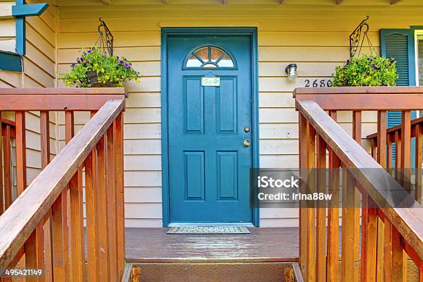 Entrance Porch With Blue Door Stock Photo - Download Image Now - Front Door, Blue, Brown