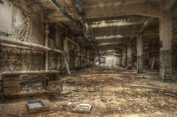 istock Old desk in an abandoned hall 495422617