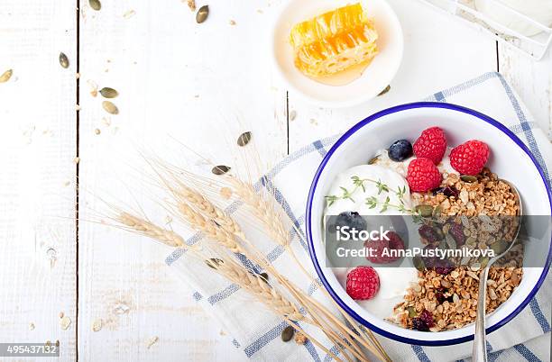Healthy Breakfast Granola With Pumpkin Seeds Honey Yogurt Fresh Berries Stock Photo - Download Image Now